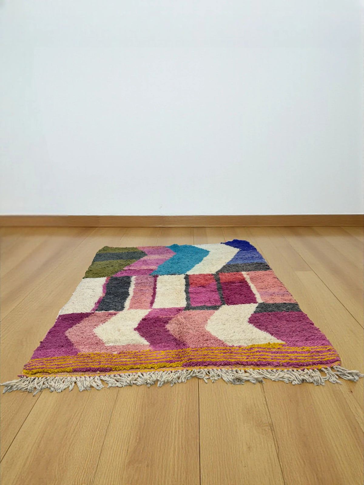 Handwoven Moroccan Bjaad carpet with bold chevron and color-block pattern in multicolor wool, 241 × 161 cm