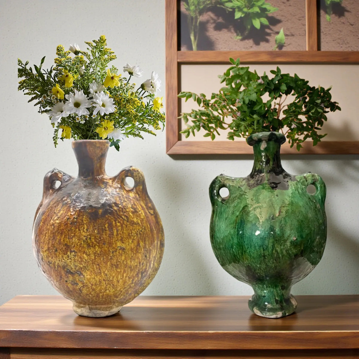 Handmade sculptural Tamegroute ceramic vase with organic open form and natural green and ochre glaze from Morocco