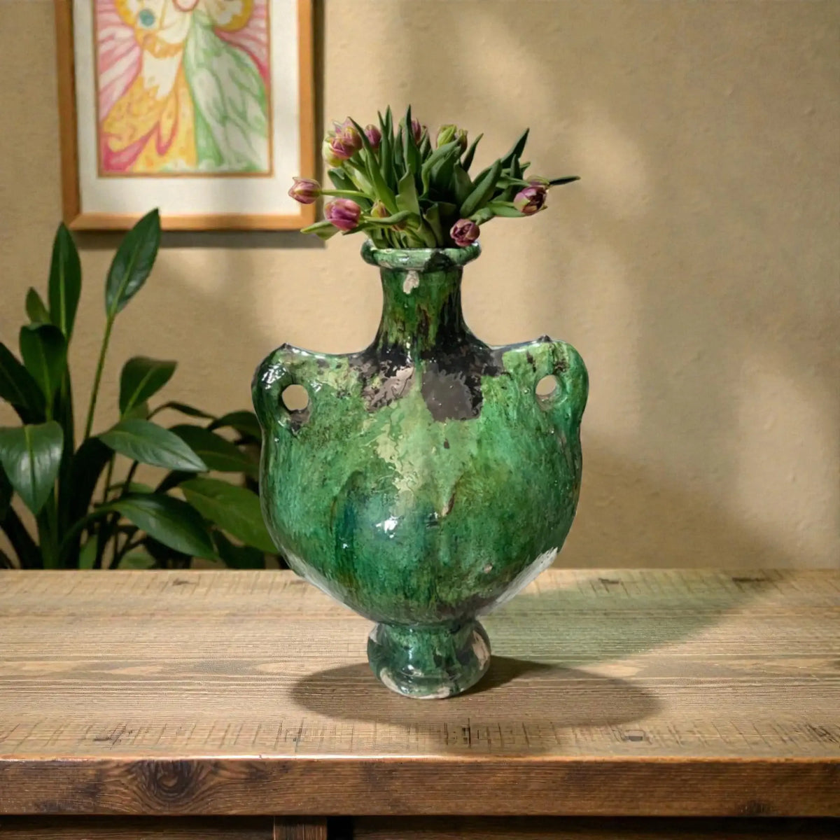 Handmade sculptural Tamegroute ceramic vase with organic open form and natural green glaze from Morocco