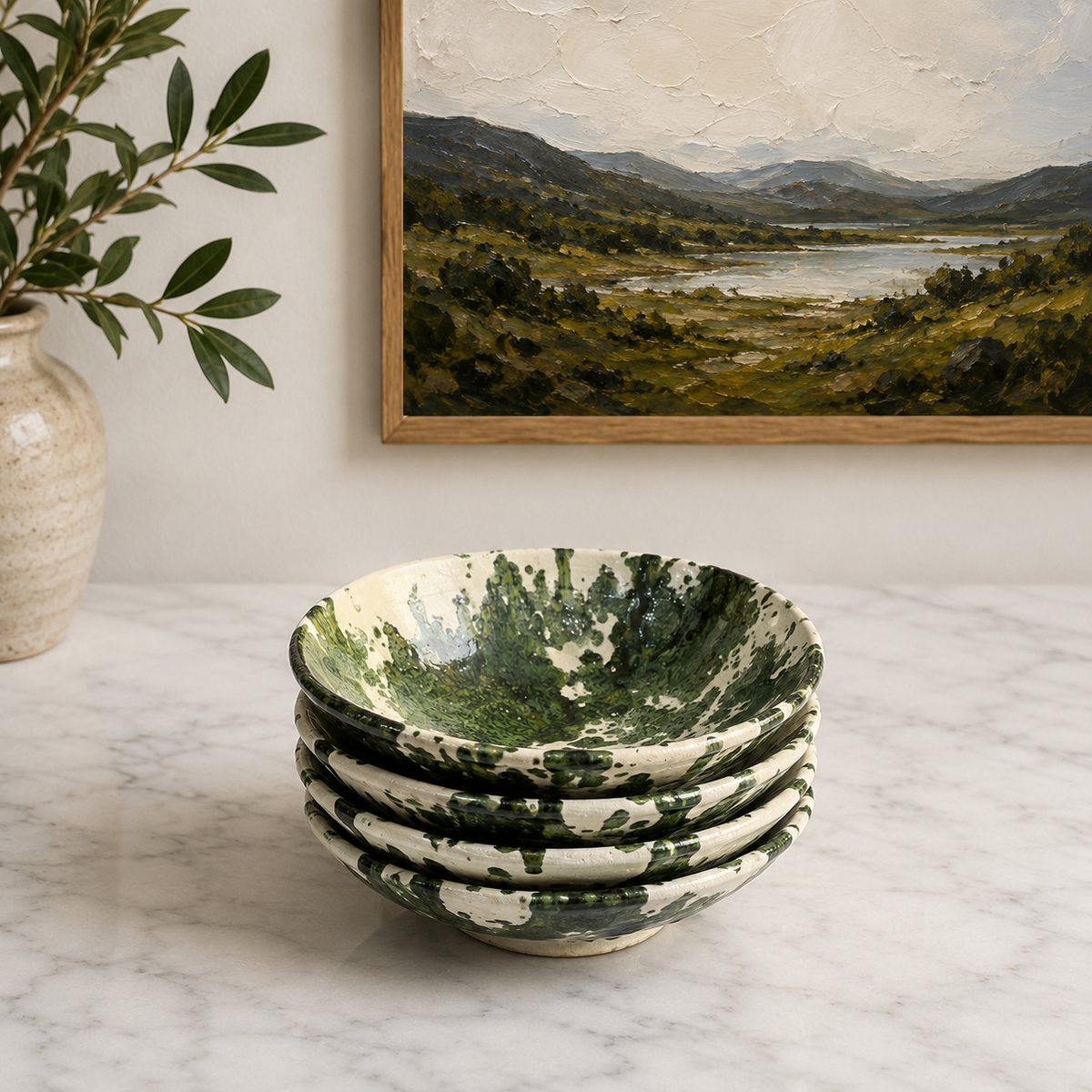 Handmade Moroccan ceramic bowls with green splatter glaze in multiple sizes
