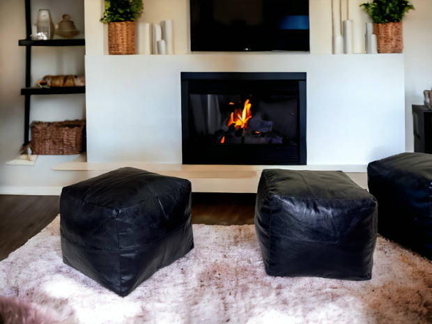 Moroccan Black Simple Square Pouf: An Enigmatic Tapestry of Berber Heritage - handmade by Moroccantastics - Berber craftsmanship, Black leather pouf, leather work, Moroccan décor, Moroccan furniture, Moroccan pouf, square pouf, Timeless pouf, Versatile pouf