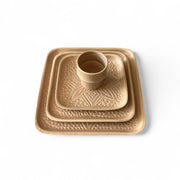 Ceramic dish with geometric patterns on a white background