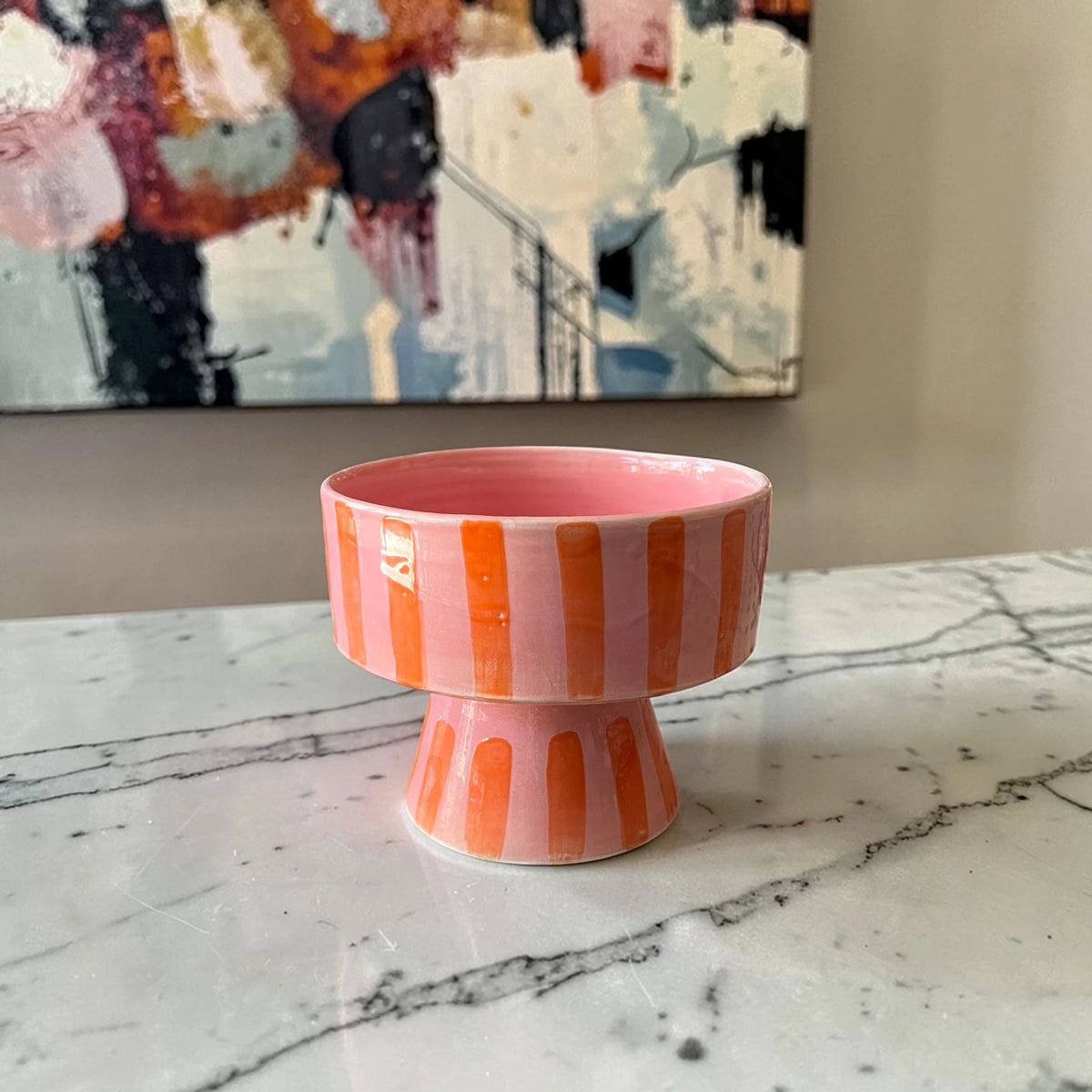 Hand-painted Moroccan pedestal ceramic bowl in rose pink with terracotta orange stripes, 16 cm tall, 14 cm diameter