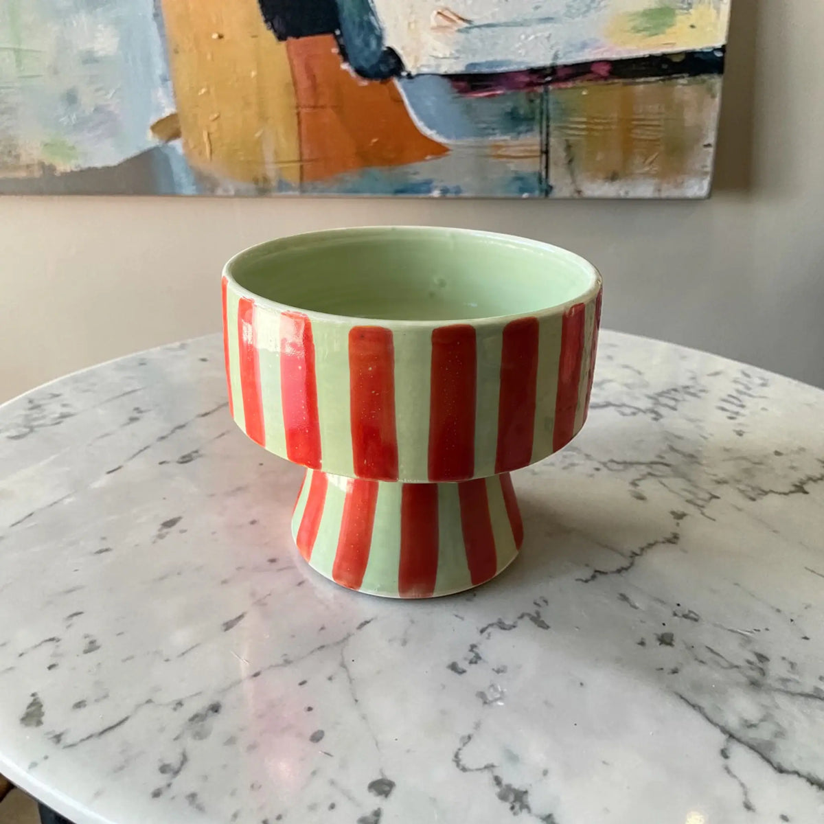 Hand-painted Moroccan pedestal ceramic bowl in sage green with red stripes, 17 cm high