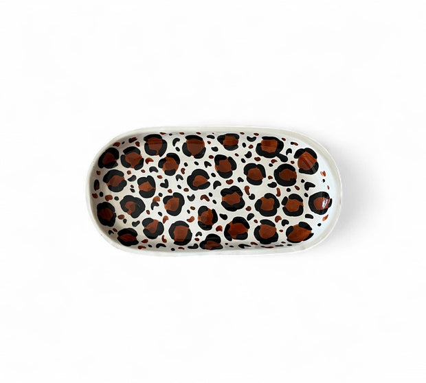 Rectangular tray with leopard print pattern on a white background