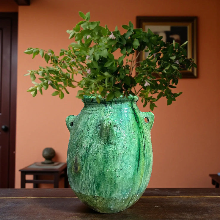 Handmade green Tamegroute vase with side handles and rustic glaze, Moroccan pottery