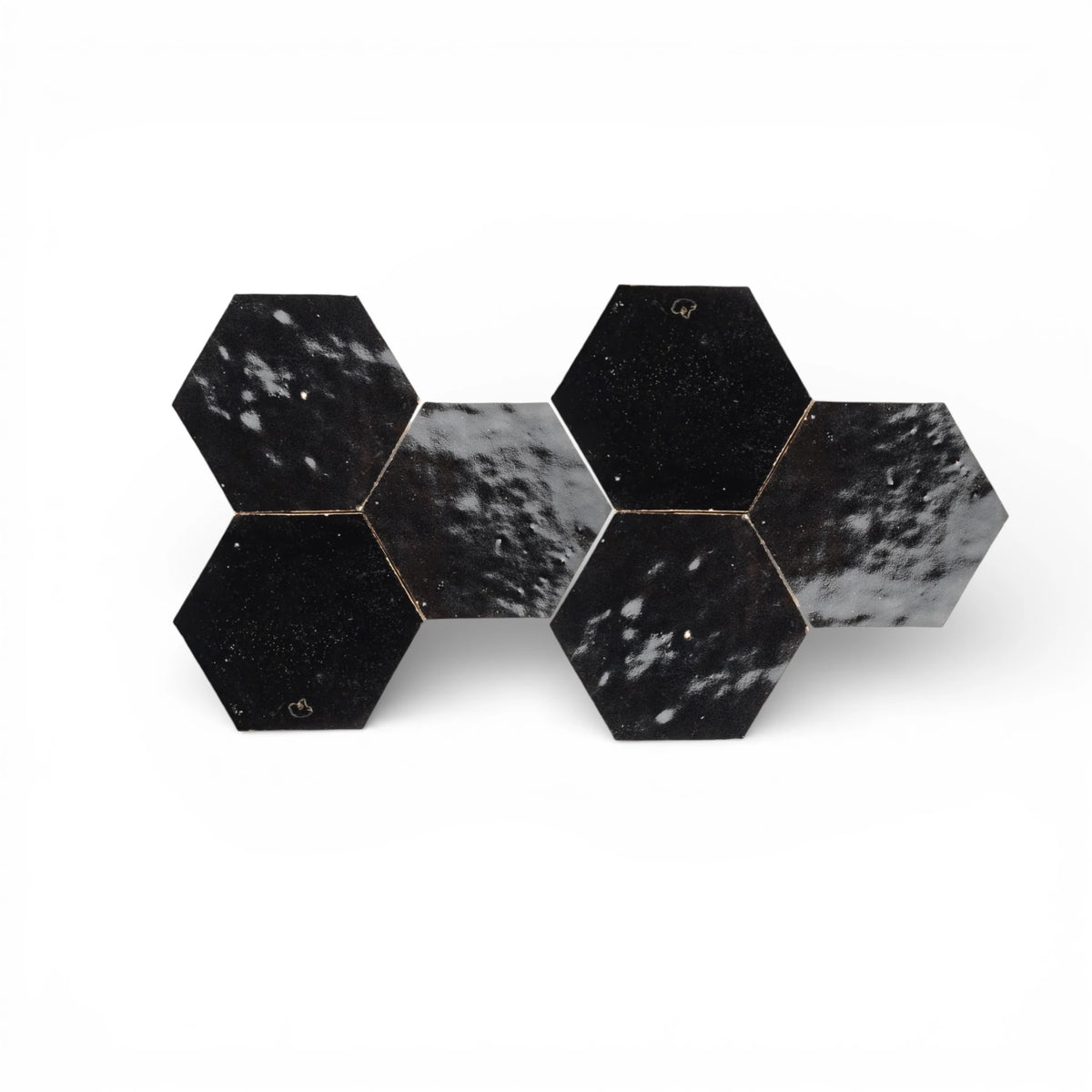 Handmade black hexagon zellige tile with glazed surface and natural variation