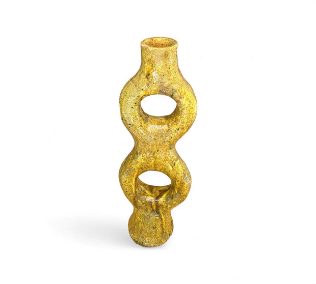 Decorative gold vase with a textured, wavy design on a white background