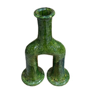 Green ceramic vase with unique design on a white background