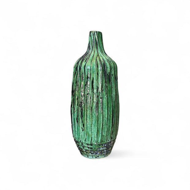 Green textured vase on a white background