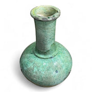 Green ceramic vase on a white background