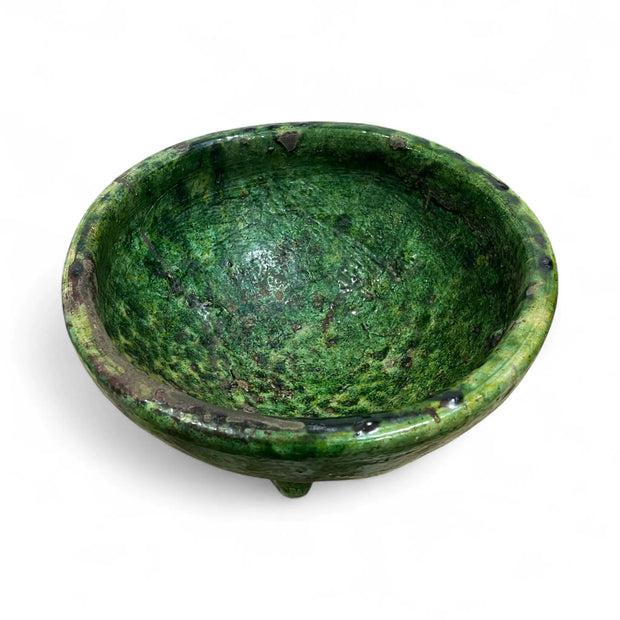 Green ceramic bowl Planter with three legs on a white background