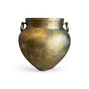 Bronze vase with textured surface and ring handles on a white background