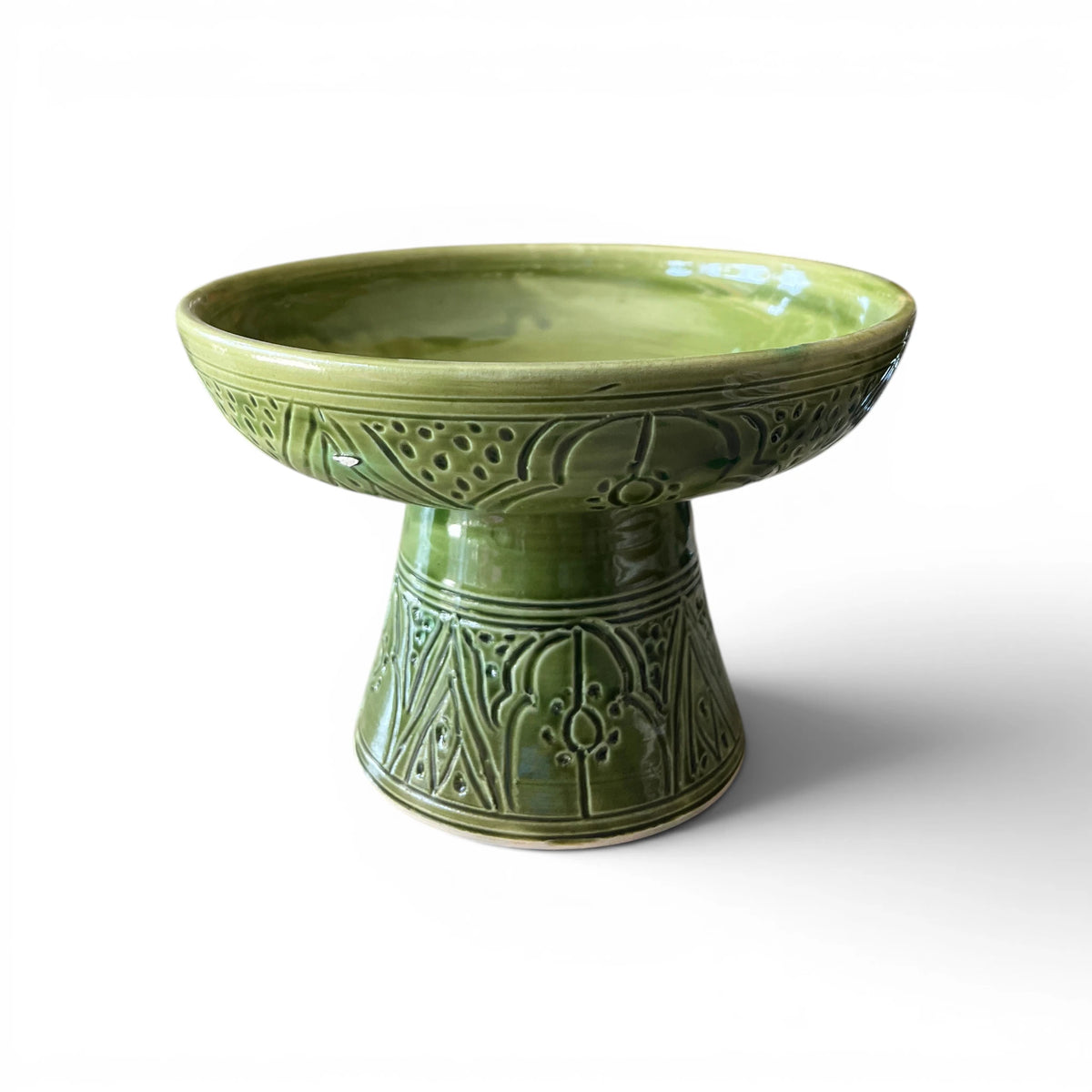 Handmade green ceramic pedestal bowl with hand-engraved Moroccan patterns