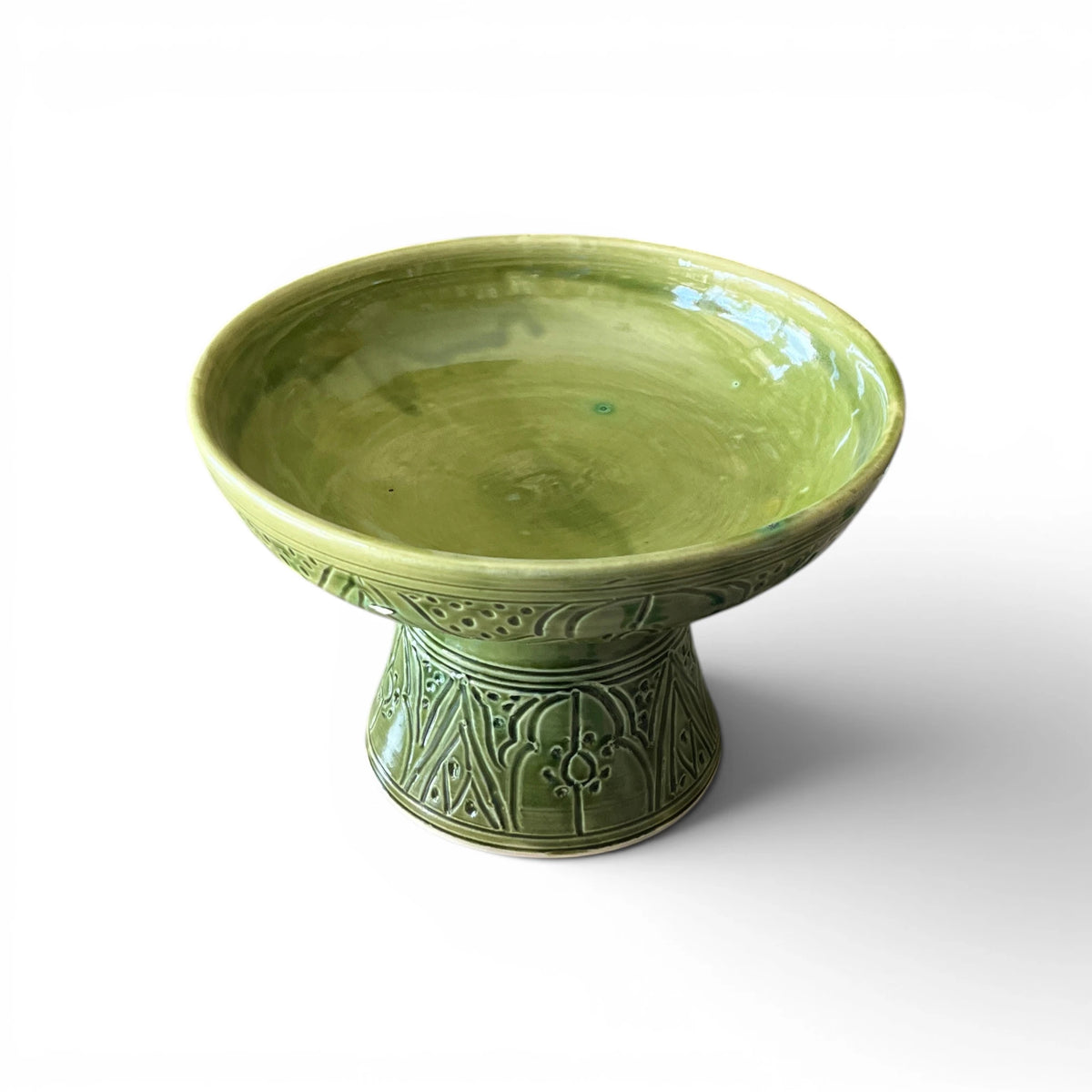 Handmade green ceramic pedestal bowl with hand-engraved Moroccan patterns