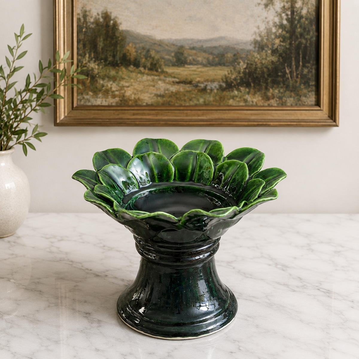 Handmade green ceramic pedestal bowl with flower-inspired design and elevated base