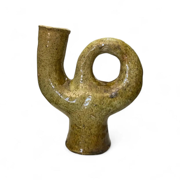 Ceramic vase shaped like the number '4' on a white background