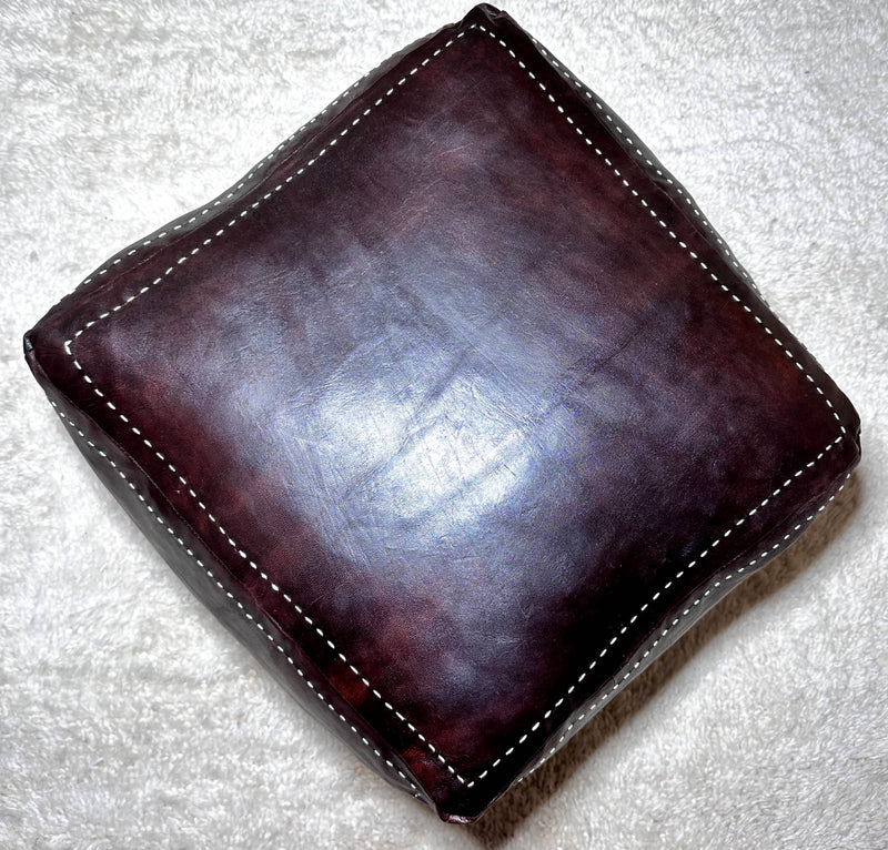 Moroccan Brown Square Pouf: A Timeless Treasure of Berber Craftsmanship - handmade by Moroccantastics - authentic Moroccan pouf, Berber craftsmanship, brown leather pouf, genuine Moroccan leather pouf, hand-stitched pouf, handcrafted pouf, leather work, Moroccan décor, Moroccan furniture, Moroccan pouf, square pouf