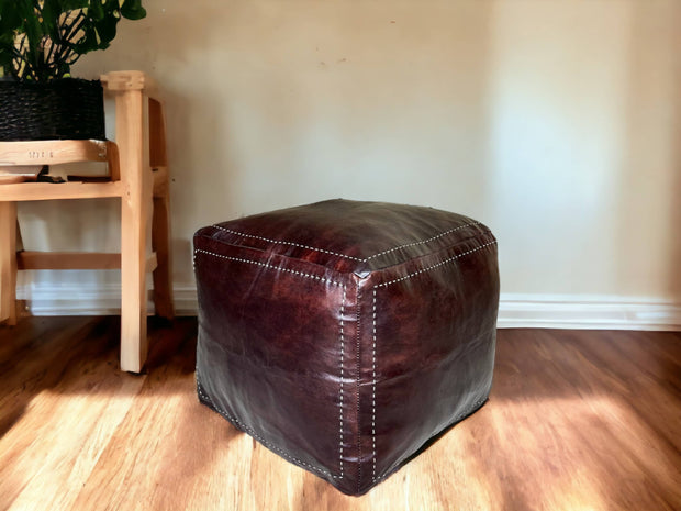 Moroccan Brown Square Pouf: A Timeless Treasure of Berber Craftsmanship - handmade by Moroccantastics - authentic Moroccan pouf, Berber craftsmanship, brown leather pouf, genuine Moroccan leather pouf, hand-stitched pouf, handcrafted pouf, leather work, Moroccan décor, Moroccan furniture, Moroccan pouf, square pouf