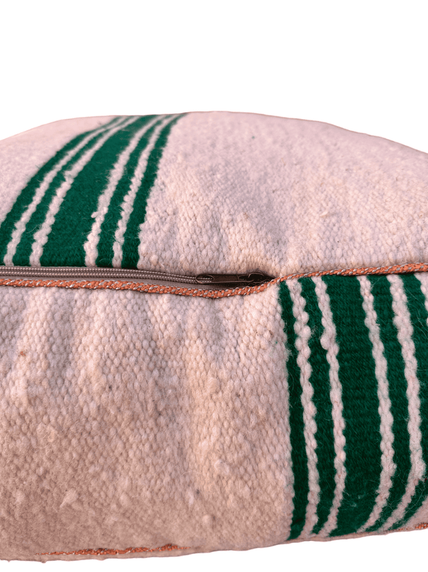 Authentic Moroccan charm in every thread. Unstuffed Berber rug pouf, crafted from 100% wool for warmth and comfort. A historic touch with a Moroccan pattern, ready for your personalization. Smooth zipper for easy customization. Embrace the authenticity delivered to your doorstep.