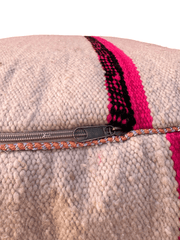 Authentic Moroccan charm in every thread. Unstuffed Berber rug pouf, crafted from 100% wool for warmth and comfort. A historic touch with a Moroccan pattern, ready for your personalization. Smooth zipper for easy customization. Embrace the authenticity delivered to your doorstep.