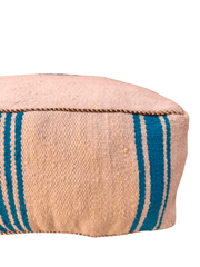 Authentic Moroccan charm in every thread. Unstuffed Berber rug pouf, crafted from 100% wool for warmth and comfort. A historic touch with a Moroccan pattern, ready for your personalization. Smooth zipper for easy customization. Embrace the authenticity delivered to your doorstep.