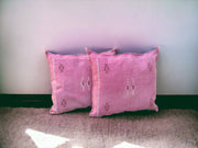 Handmade lumbar cushion with intricate Moroccan Sabra design, perfect for home decor.