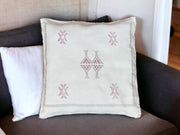 Handmade lumbar cushion with intricate Moroccan Sabra design, perfect for home decor.