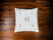 Handmade lumbar cushion with intricate Moroccan Sabra design, perfect for home decor.