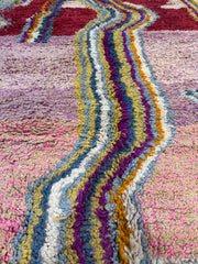 Handwoven Moroccan Bjaad carpet with abstract flow and diamond design in multicolor wool, 246 × 166 cm