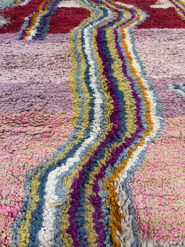 Handwoven Moroccan Bjaad carpet with abstract flow and diamond design in multicolor wool, 246 × 166 cm