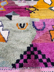 Close-up of a colorful textured fabric with geometric patterns