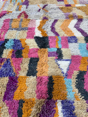 Multicolored textured fabric with a patchwork pattern