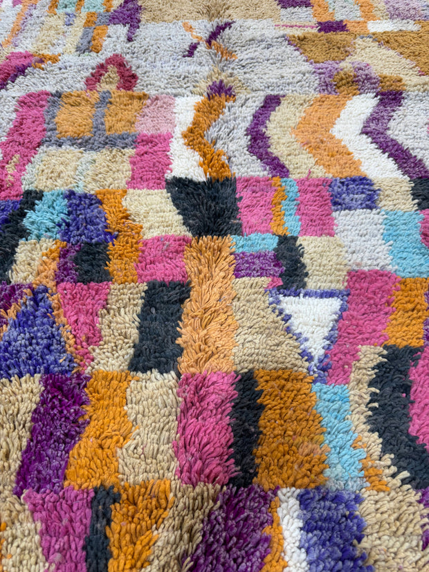Multicolored textured fabric with a patchwork pattern