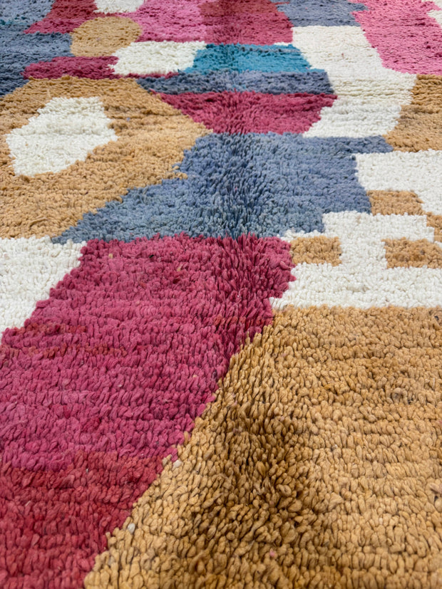 Handwoven Moroccan Bjaad carpet with abstract earth and rose geometric design in multicolor wool, 229 × 161 cm