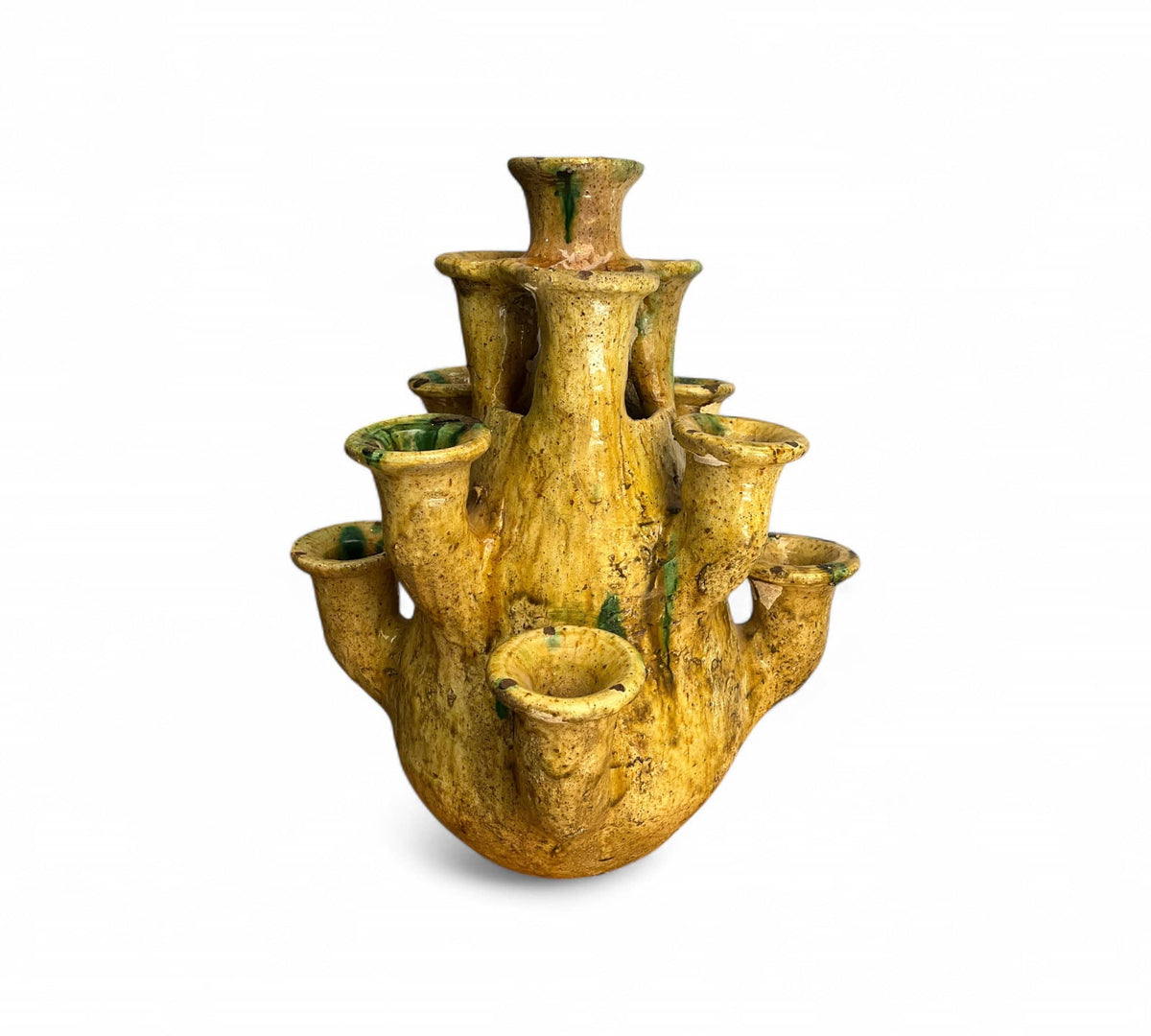 Vintage-style yellow ceramic vase with multiple nozzles on a white background