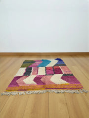 Handwoven Moroccan Bjaad carpet with bold chevron and color-block pattern in multicolor wool, 241 × 161 cm