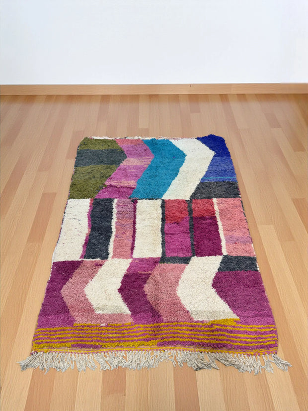 Handwoven Moroccan Bjaad carpet with bold chevron and color-block pattern in multicolor wool, 241 × 161 cm
