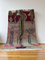 Handwoven Moroccan Bjaad carpet with abstract flow and diamond design in multicolor wool, 246 × 166 cm