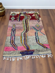Handwoven Moroccan Bjaad carpet with abstract flow and diamond design in multicolor wool, 246 × 166 cm
