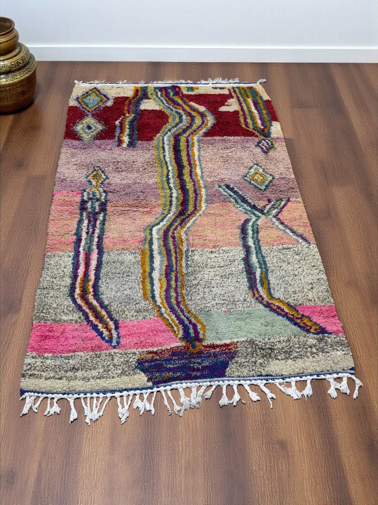 Handwoven Moroccan Bjaad carpet with abstract flow and diamond design in multicolor wool, 246 × 166 cm