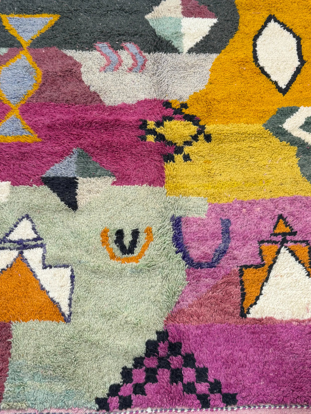 Colorful geometric-patterned rug with vibrant colors