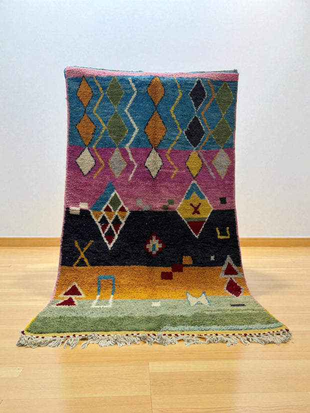 Handwoven Moroccan Bjaad carpet with tribal geometric motifs in multicolor wool, 264 × 151 cm