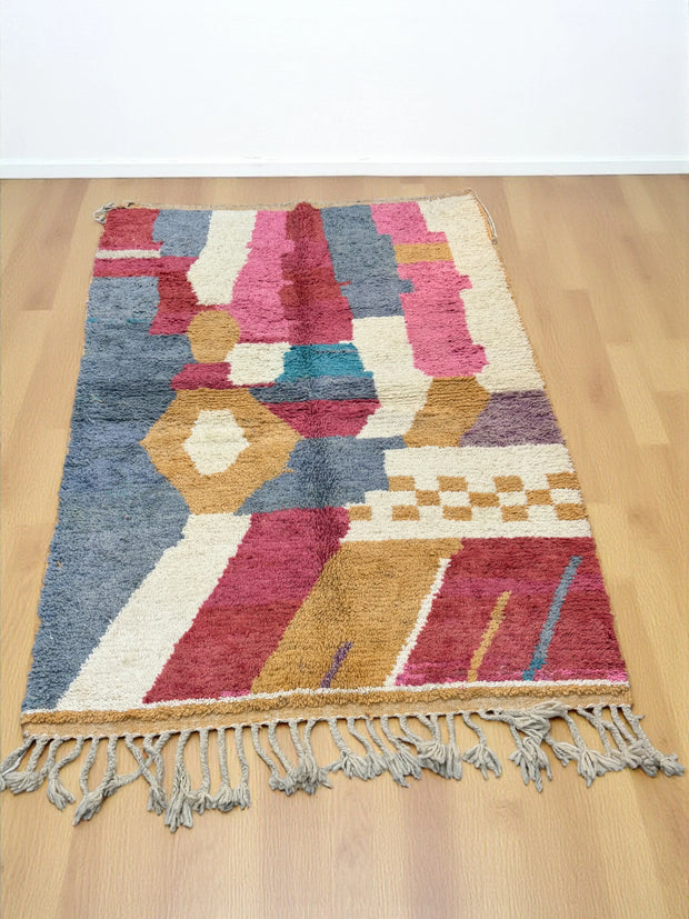 Handwoven Moroccan Bjaad carpet with abstract earth and rose geometric design in multicolor wool, 229 × 161 cm