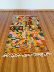 Handwoven Moroccan Bjaad carpet with kaleidoscope tribal geometric design in multicolor wool, 238 × 155 cm