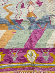 Handwoven Moroccan Bjaad carpet with soft tribal geometric design in multicolor wool, 244 × 160 cm
