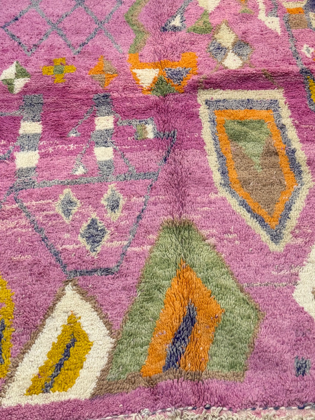 Handwoven Moroccan Bjaad carpet with blush pink geometric tribal motifs in multicolor wool, 269 × 147 cm