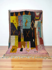 Handwoven Moroccan Bjaad carpet with abstract village geometric pattern in natural wool, 264 × 169 cm