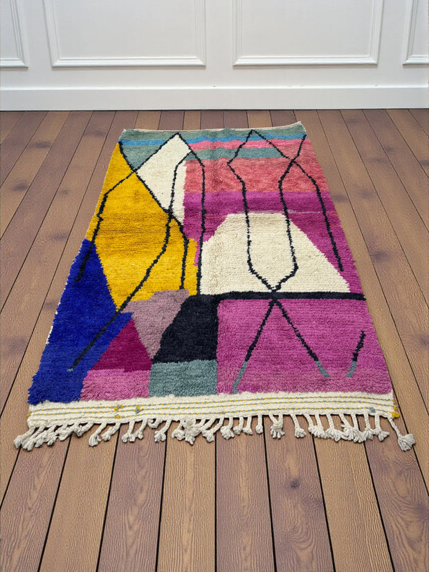 Handwoven Moroccan Bjaad carpet with abstract geometric architectural pattern in multicolor wool, 252 × 165 cm