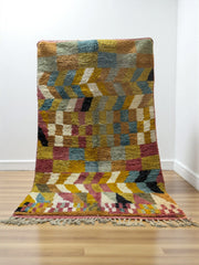 Handwoven Moroccan Bjaad carpet with checker and chevron geometric design in multicolor wool, 267 × 155 cm